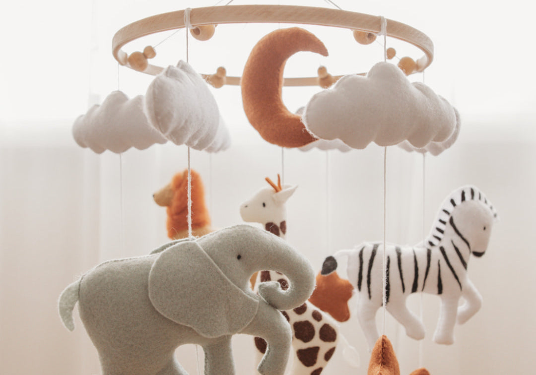 hand made baby mobile with safari animals